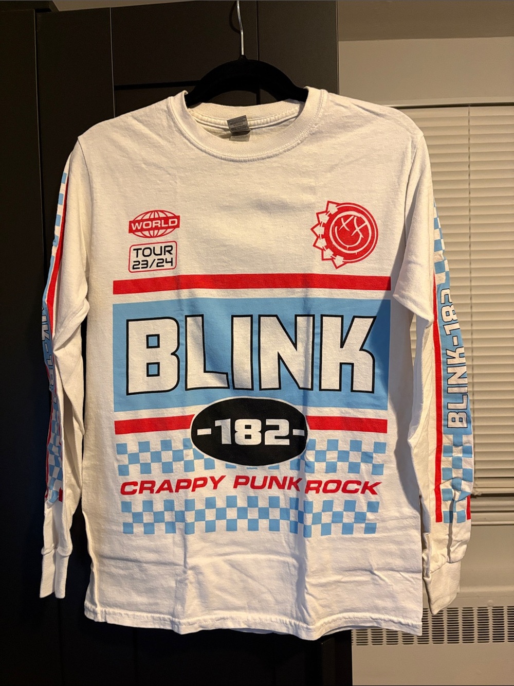 Blink-182 Tour White Long Sleeve Graphic Tee with Light Blue & Red Accents